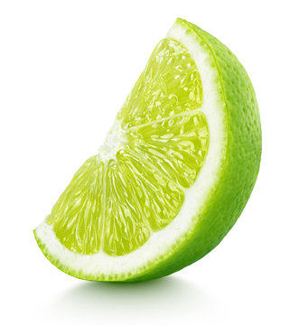 Fototapeta Ripe slice of green lime citrus fruit stand isolated on white background with clipping path