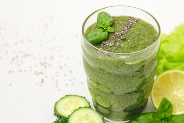 Green smoothie with ingredients