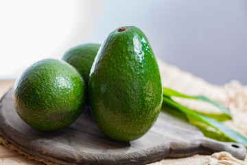 Green ripe avocado from organic avocado plantation - healthy food