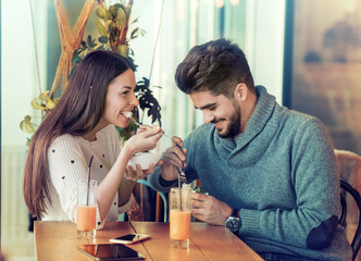 Romantic couple having rest in cafe