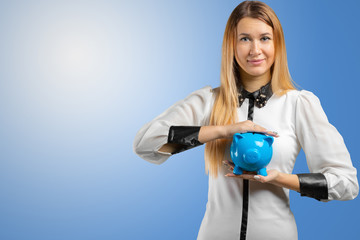 Woman holding piggy bank