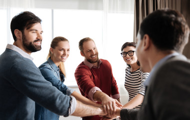 Photo of happy office workers while spending time together