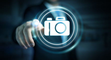 Businessman using modern camera application 3D rendering