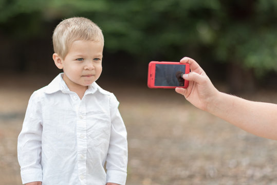 Young Boy Getting Photo Taken