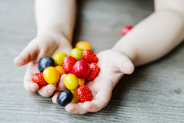 fruits in little child hands - kid