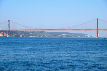 25th of April Bridge suspension bridge over river Tejo in Lisbon