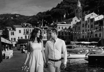 happy couple walking on the street in Italy