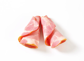 Slices of smoked pork - rolled up