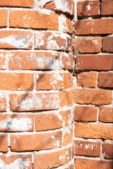 Obraz premium curved part textured old brick wall of red color