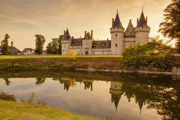 Obraz premium The chateau of Sully-sur-Loire at sunset, France. Castle is located in the Loire Valley. Sully-sur-Loire, France.