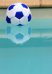 Football Floating in Pool