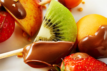 Fresh tropical fruit dipped in chocolate