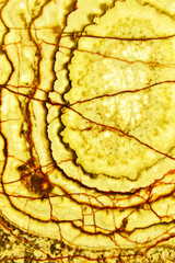 Abstract yellow Marble texture in natural patterned for background and design.