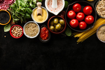 Food background Food Concept with Various Tasty Fresh Ingredients for Cooking. Italian Food Ingredients. View from Above with Copy Space.