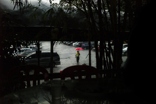 Person under heavy rain