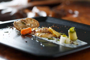marinated brook trout with pickled vegetables and bread