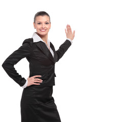 Obraz premium Business woman points to advertise on the wall