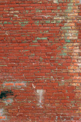 Old red brick wall in a background image. Texture background. Vintage effect.