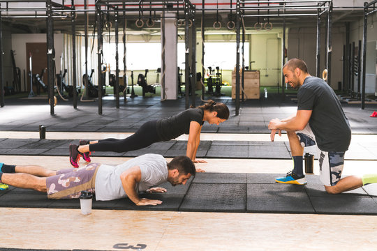 Man looking at people training