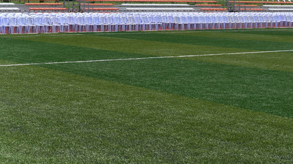 Football field lines on a grass background