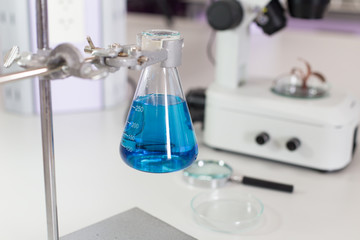 Scientist researching chemistry, technology and biology in laboratory.