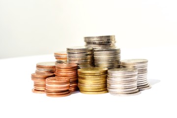 Many stacks of coins in various sizes and valued,Business and finance