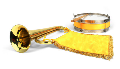 Typical soviet pioneer trumpet with yellow flag and drum on white background isolated