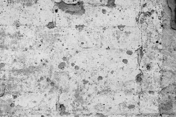Wall fragment with scratches and cracks