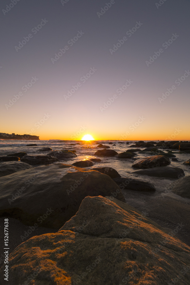 Wall mural Sunrise at the beach