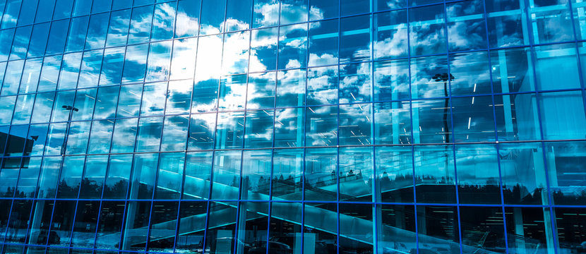 Skyscraper Windows With Reflection Of The Sky.