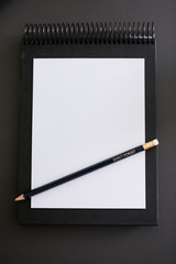 Don't forget - Blank paper with message on pen