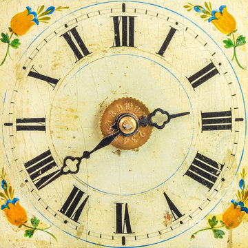 Clock with hand painted floral decoration