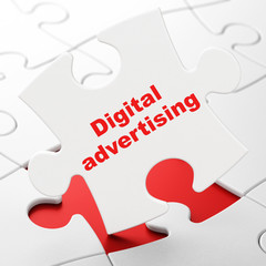 Advertising concept: Digital Advertising on puzzle background