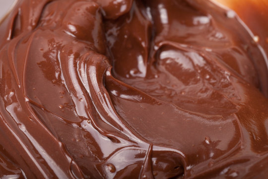 Texture of smears of soft chocolate for a background. Selective focus