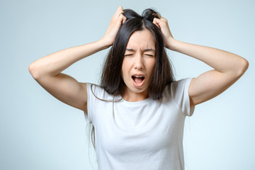 Fototapeta premium Young serious angry woman portrait