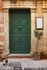 Door of a building in the old town of Chania on Crete island, Greece. 
