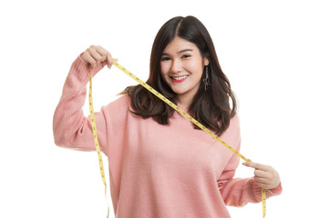 Young Asian woman with measuring tape.