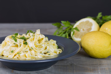 Homemade fettuccine pasta with lemon and cream.