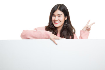 Young Asian woman show victory sign with blank sign.