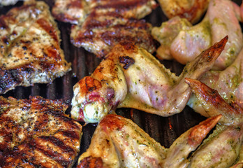 Baking fresh meat on grill closeup