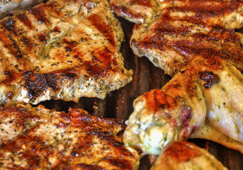 Baking fresh meat on grill closeup
