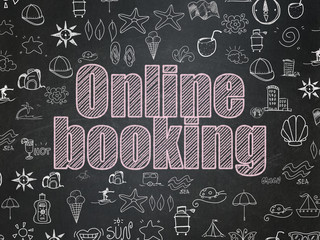 Travel concept: Online Booking on School board background