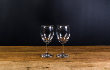 empty wine glasses on wooden board