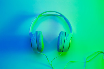 Headphones on vibrant colorful background - poster