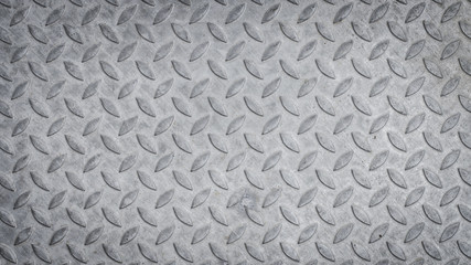 pattern style of steel floor for background . Seamless steel diamond plate texture