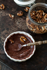 Chocolate souffle with walnuts and cocoa powder