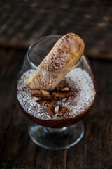 Chocolate souffle with coconut flakes in a glass