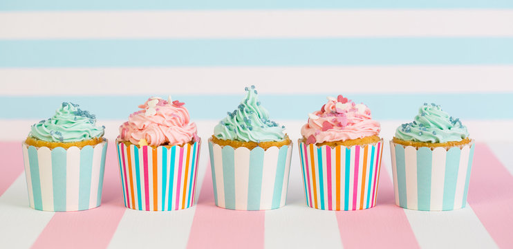 Cupcakes With Pink, White And Blue Icing