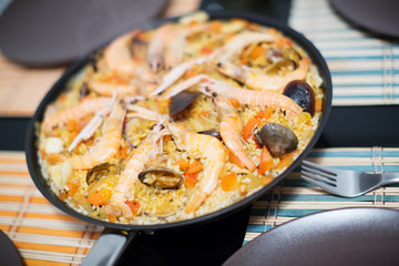 Traditional Spanish rice dish with seafood - paella