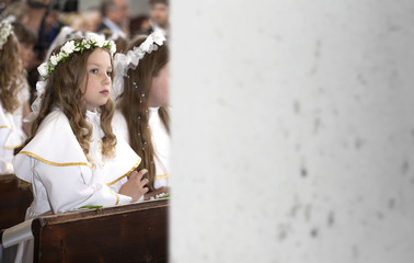 First Communion smiling girl